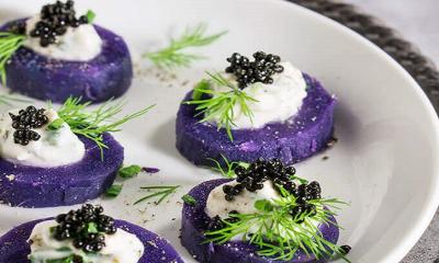 Purple Potato Chips with Creme Fraiche and Russian Osetra Caviar